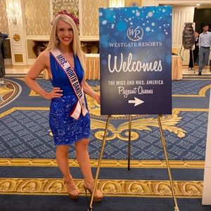 Dazzling Jonathan Kayne cocktail. Adjustable halter with a zipper in front.